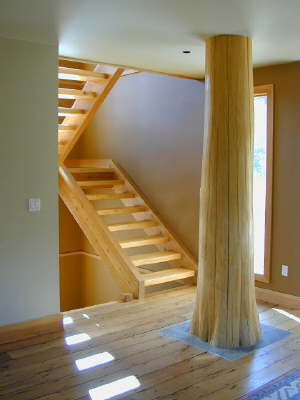 Green timber frame stairs with recycled timber log post