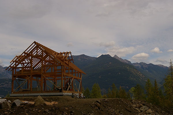 A timber frame home kit raised in the mountians of BC